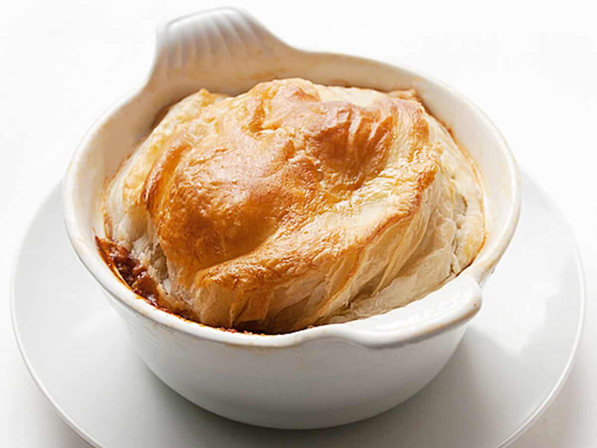 beef and guinness pot pie with puff pastry topping