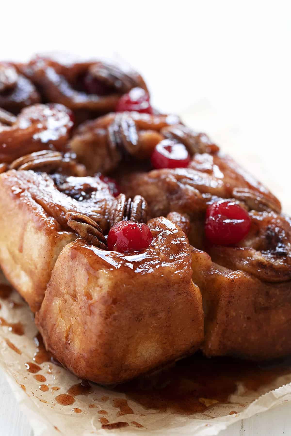 sticky chelsea bun loaf on parchment paper