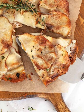 potato galette on cutting board