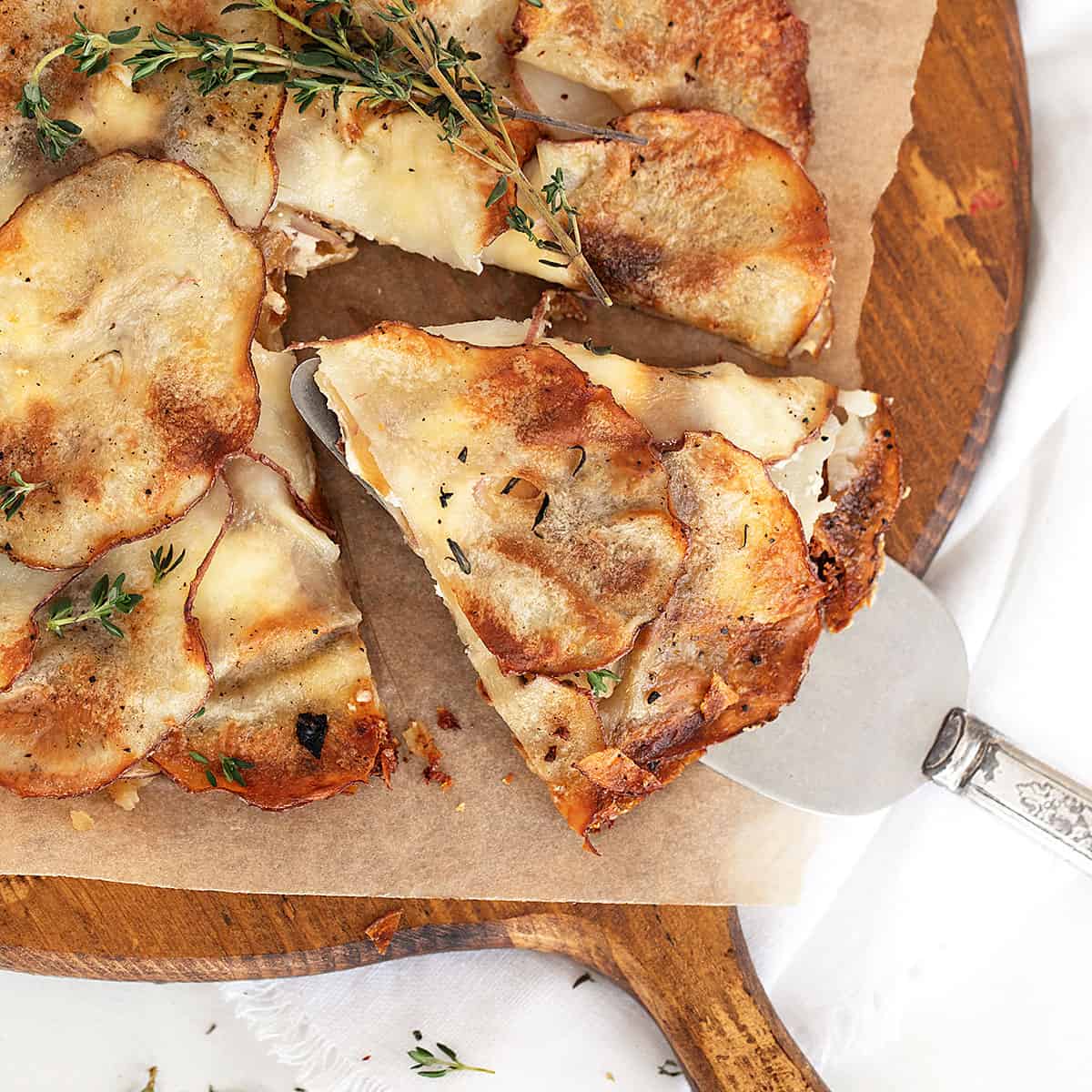 potato galette on cutting board