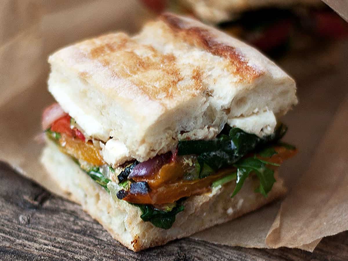 pressed roasted vegetable sandwiches on paper