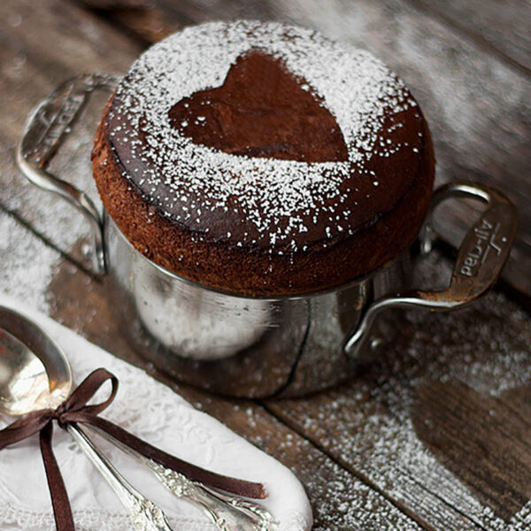 chocolate souffle in baking dish with spoons