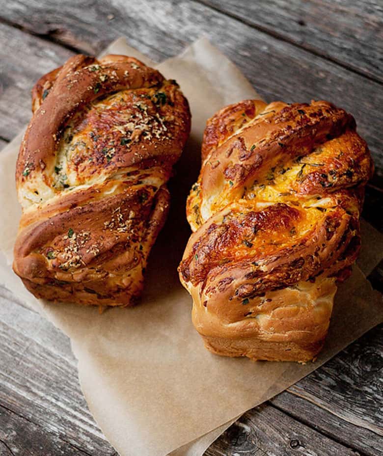 homemade cheese bread on parchment paper