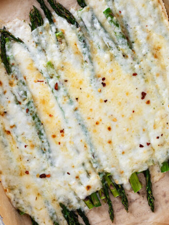 creamy asparagus on baking sheet