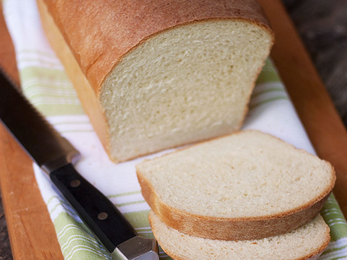 maple white sandwich bread on cutting board sliced