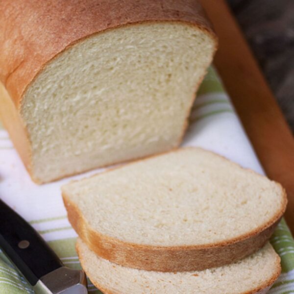 maple white sandwich bread on cutting board sliced