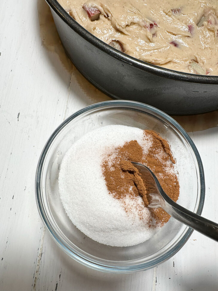 Mixing together the sugar and cinnamon topping.