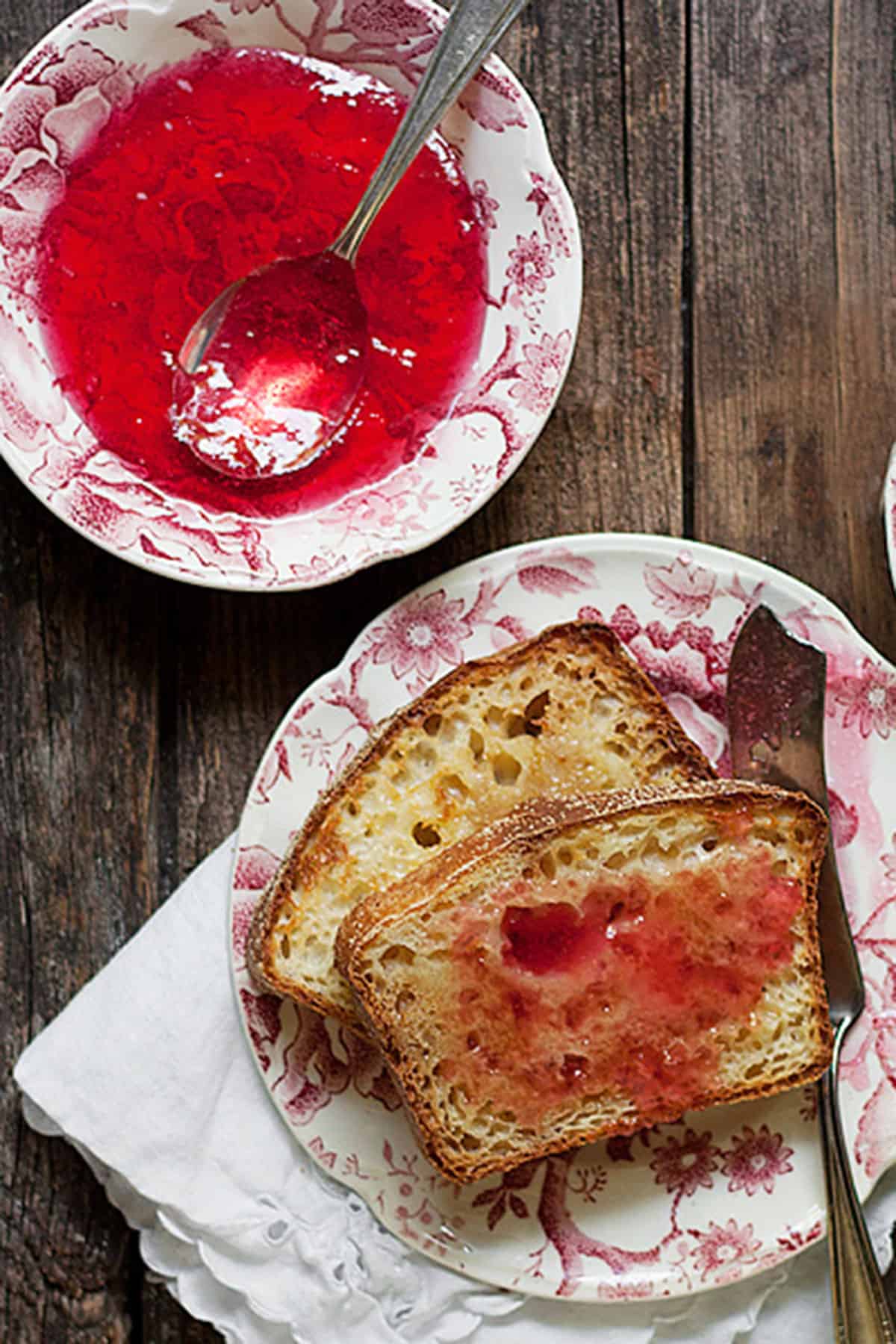 crabapple jelly in bowl with toast