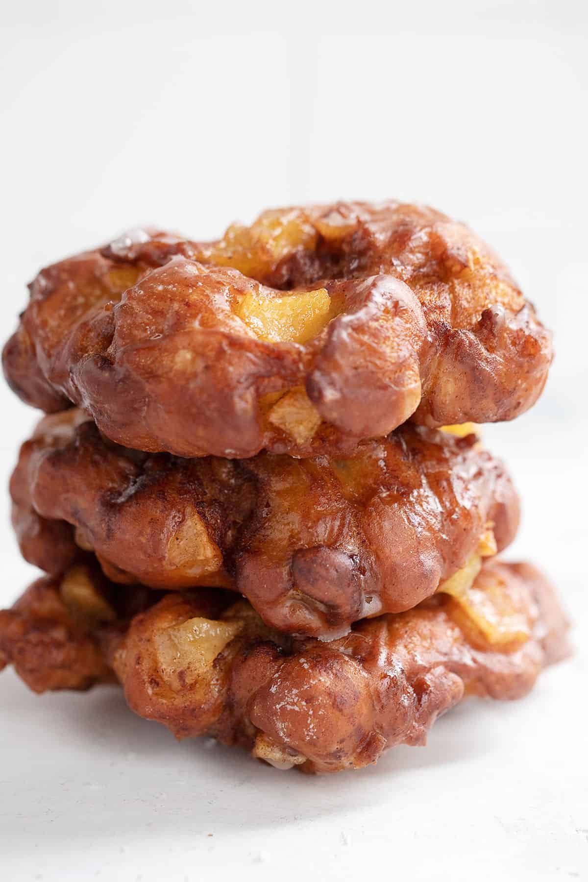 apple fritter yeast doughnuts stacked