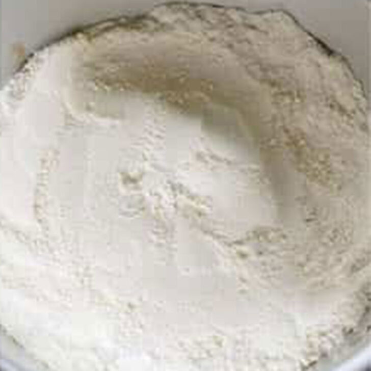 Flour and butter mixture pressed into a springform pan.