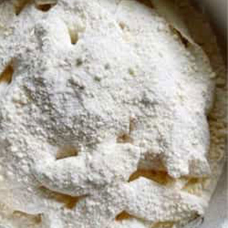 Remaining flour and butter mixture scattered over the apples.