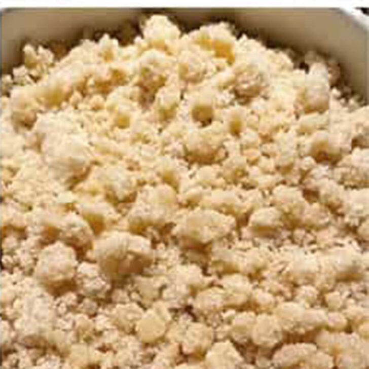 Crumble mixture added to the top of the cake.