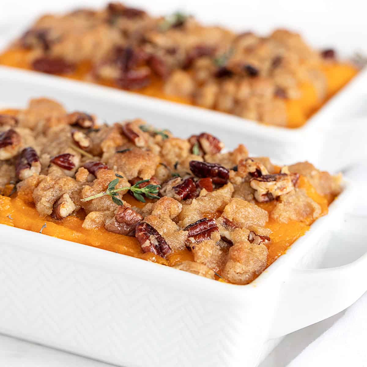 roasted butternut squash casserole in dishes
