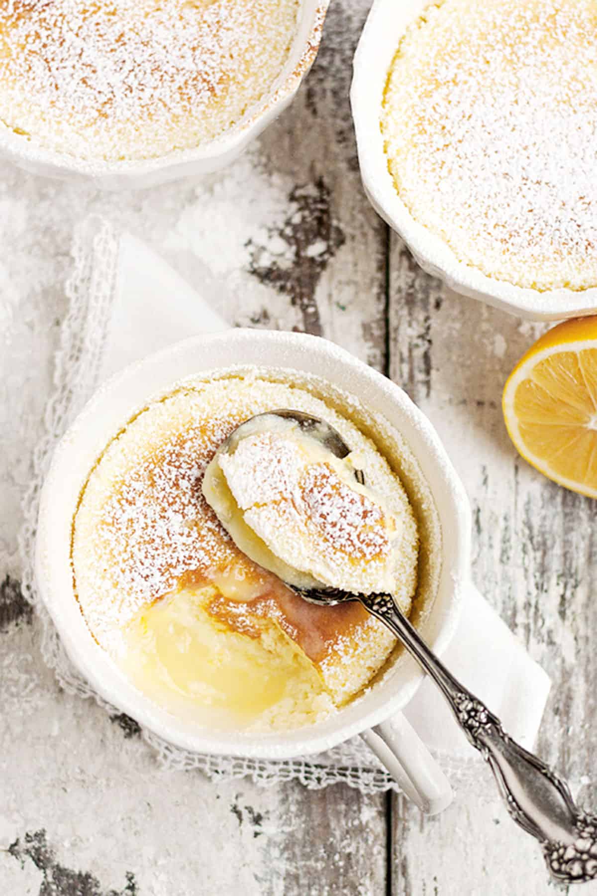 lemon pudding cakes in white tea cups