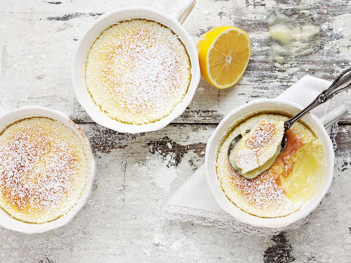 lemon pudding cakes in white tea cups