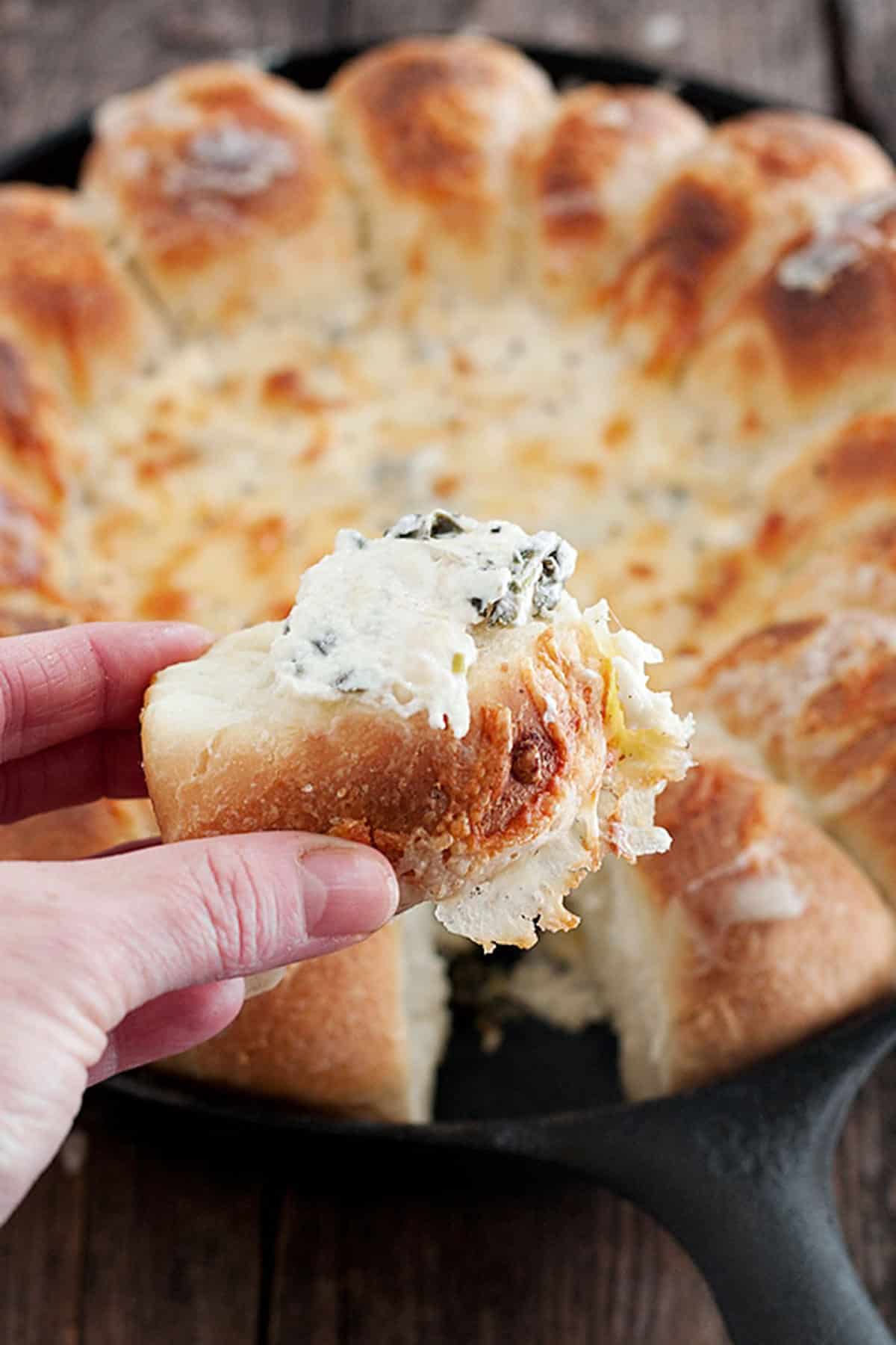 skillet bread and artichoke dip in cast iron skillet