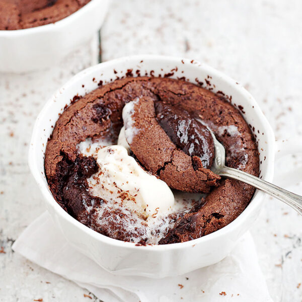 chocolate pudding cake in bowl with spoon