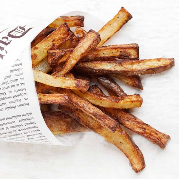 perfect air fryer fries wrapped in newspaper wrap