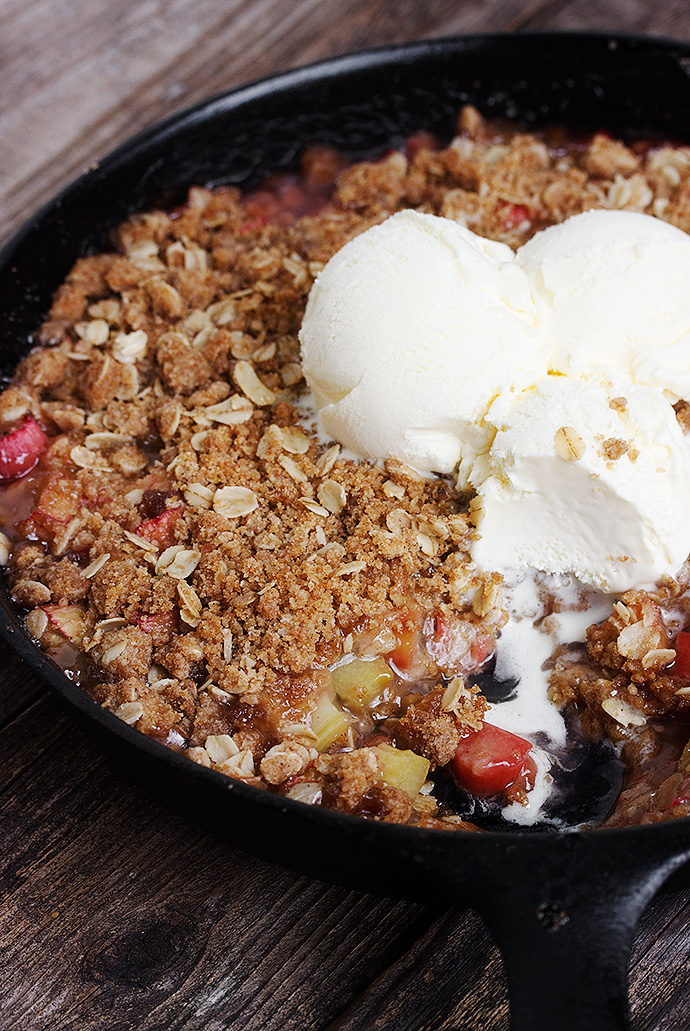 Skillet Rhubarb Cisp - with a crunch layer on both the top and bottom and sweet, saucy rhubarb in between, this is rhubarb perfection | Seasons and Suppers