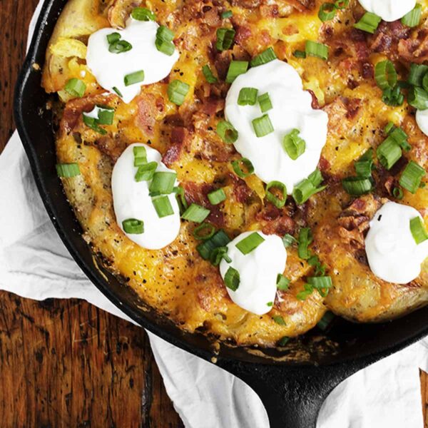 loaded smashed potato skillet in cast iron skillet