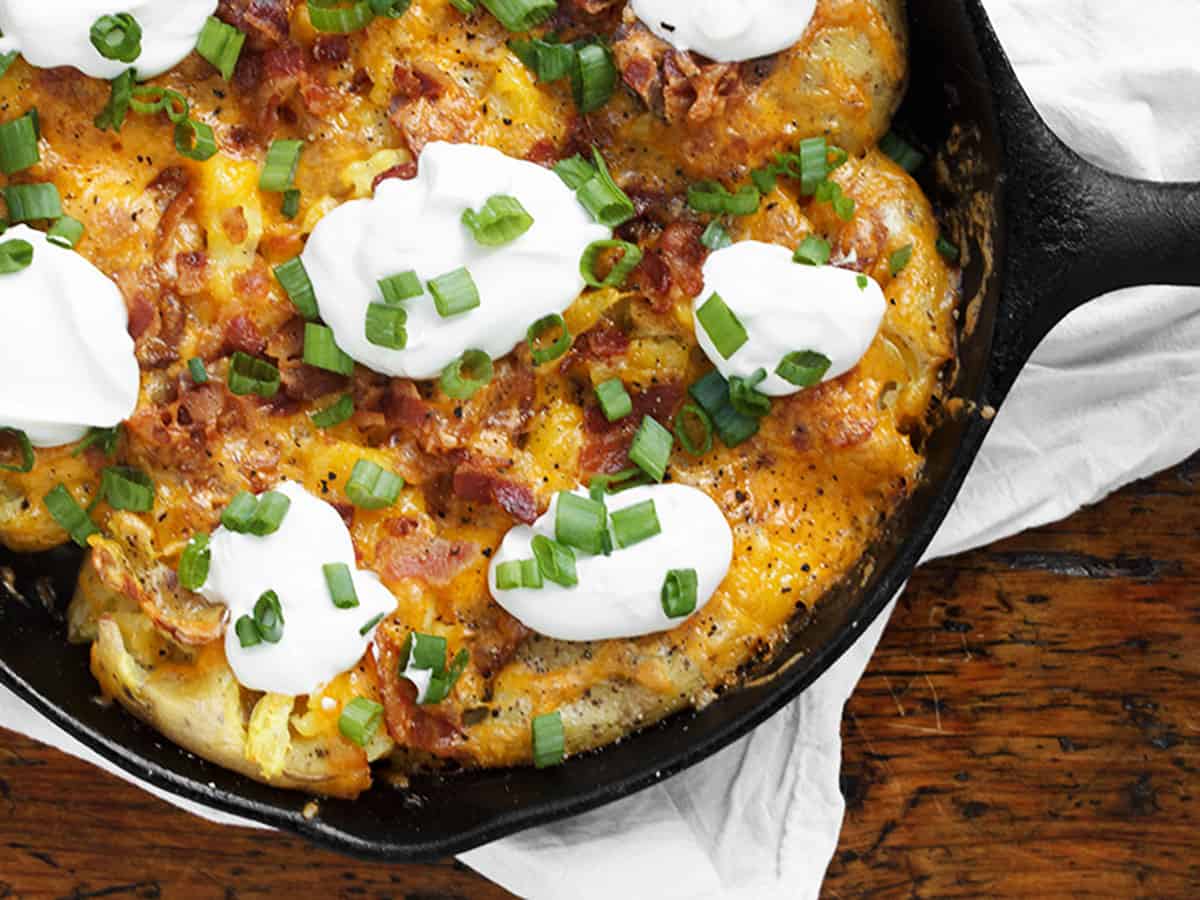 loaded smashed potato skillet in cast iron skillet