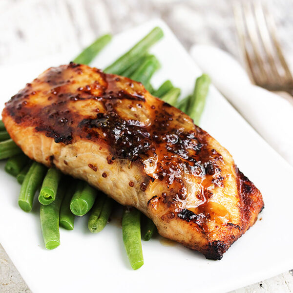 grilled maple mustard salmon on plate with green beans
