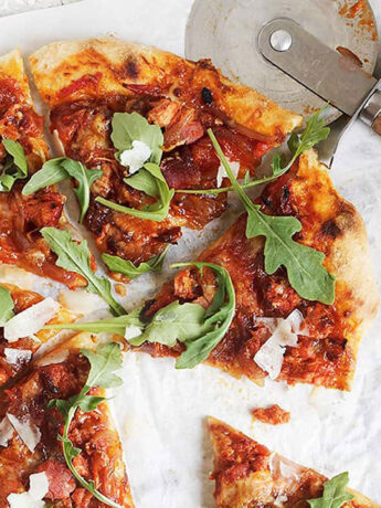 manchego chorizo pizza sliced on parchment