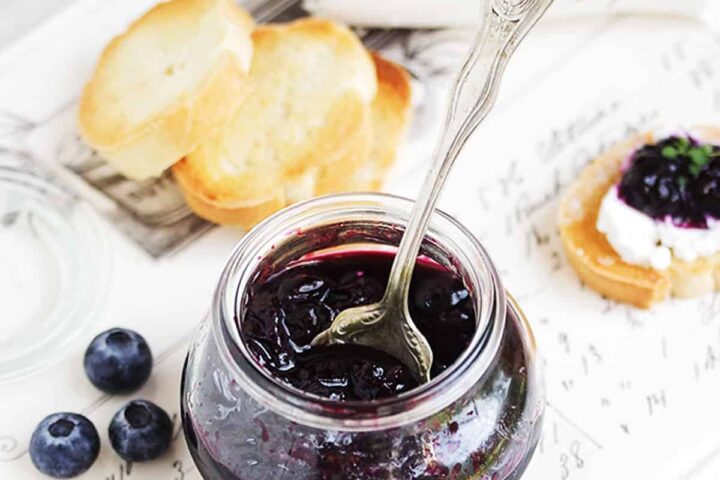 quick pickled blueberries in jar with crostini