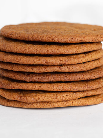 thin crispy molasses cookies stacked