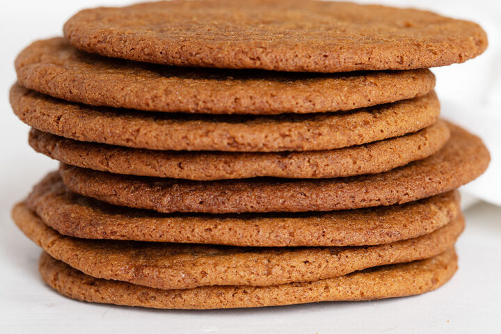 thin crispy molasses cookies stacked