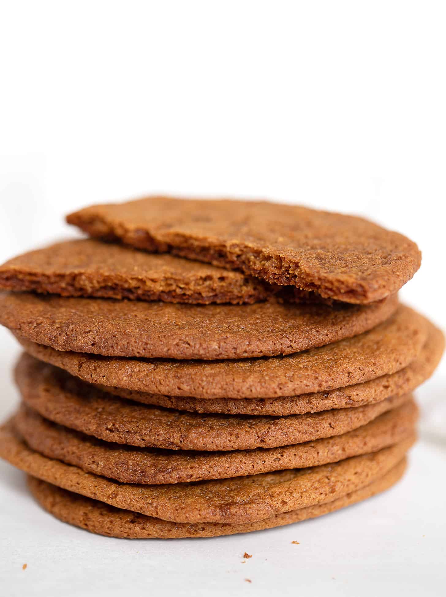 thin crispy molasses cookies stacked