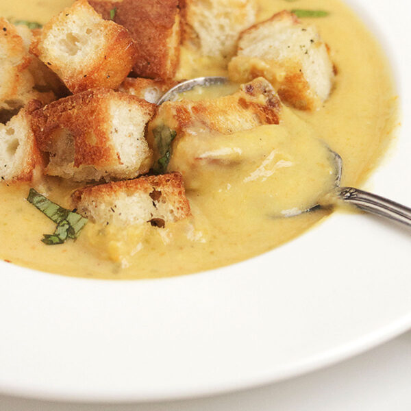 cream of vegetable soup in bowl with croutons