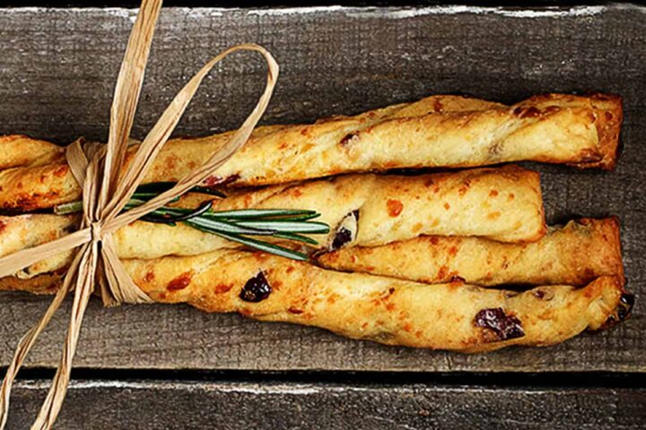 cheese twists with cranberries tied up together