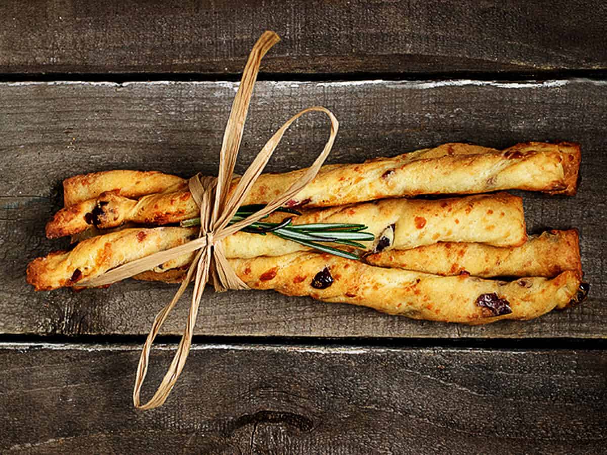 cheese twists with cranberries tied up together
