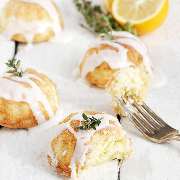 mini lemon thyme olive oil cakes on table