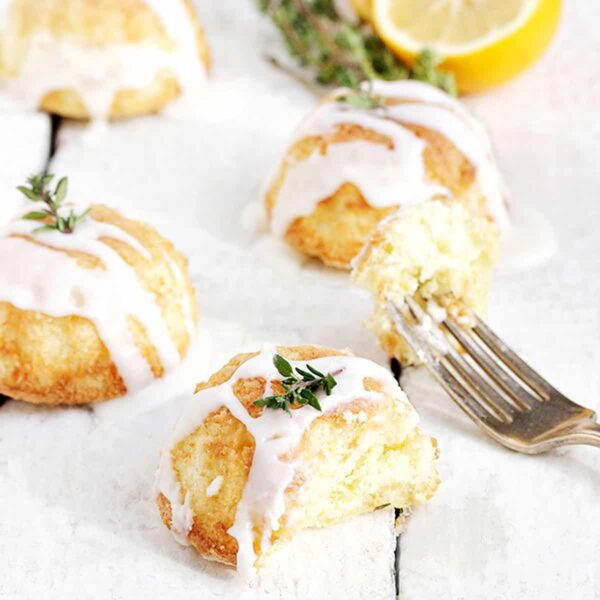 lemon thyme olive oil cakes on white background