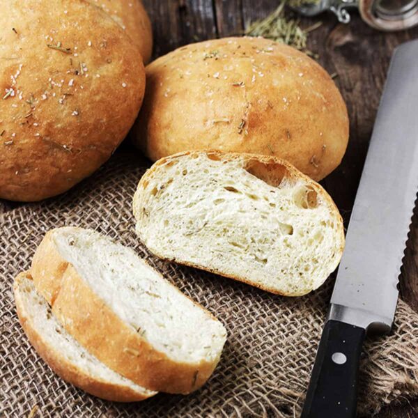 mini rosemary olive oil bread sliced with knife