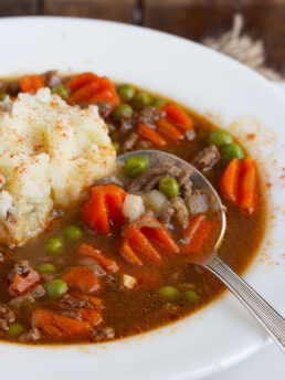 Shepherd's pie soup in bowl with spoon