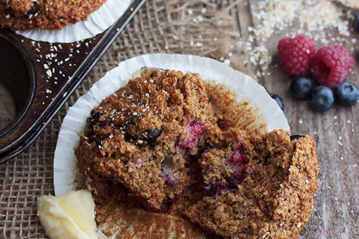 berry bran muffins cut with butter