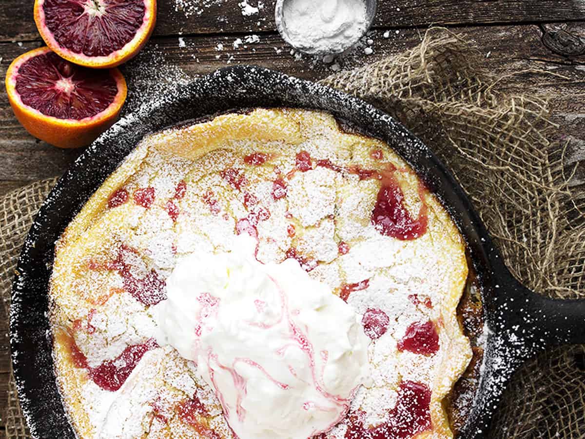 Dutch baby with blood orange syrup on top