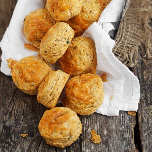 chipotle cheddar biscuits on wood background