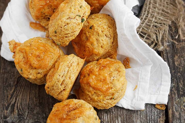 chipotle cheddar biscuits on wood background