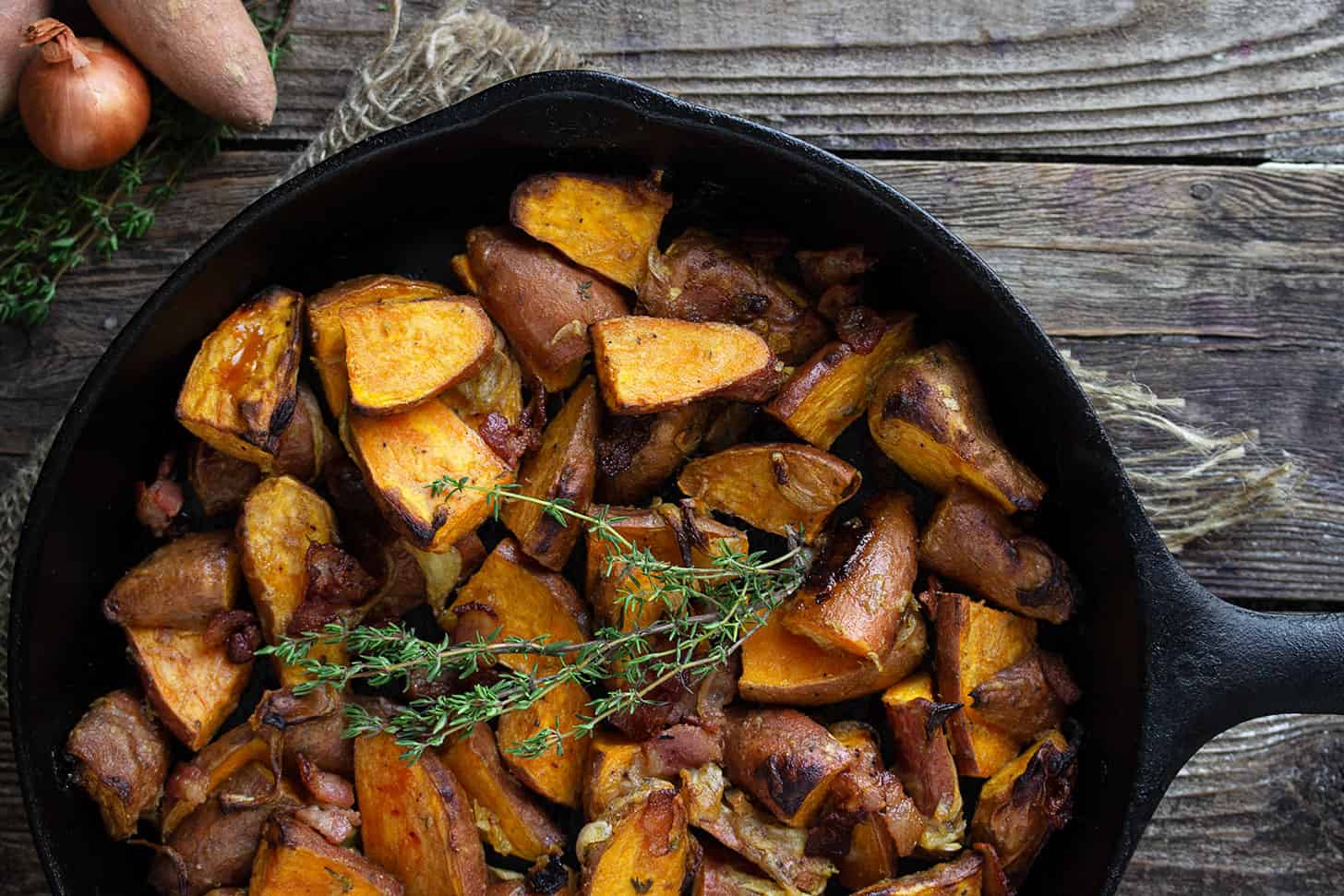 roasted sweet potatoes in cast iron skillet