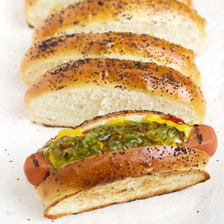 top sliced hot dog buns on white background