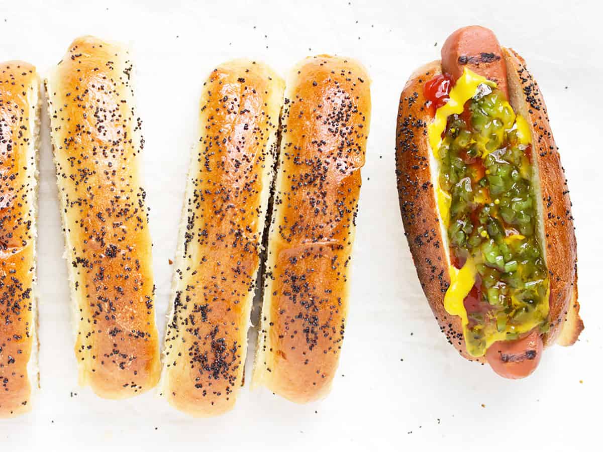 top sliced hot dog buns on white background