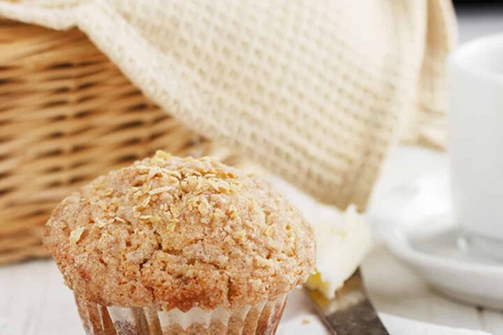maple muffins in basket with one out