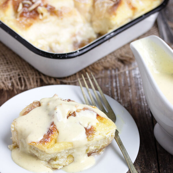 rhubarb bread pudding topped with crème anglaise