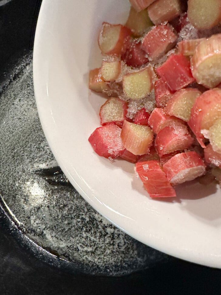 Adding rhubarb to melted butter in skillet