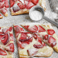 strawberry cream tarts on parchment
