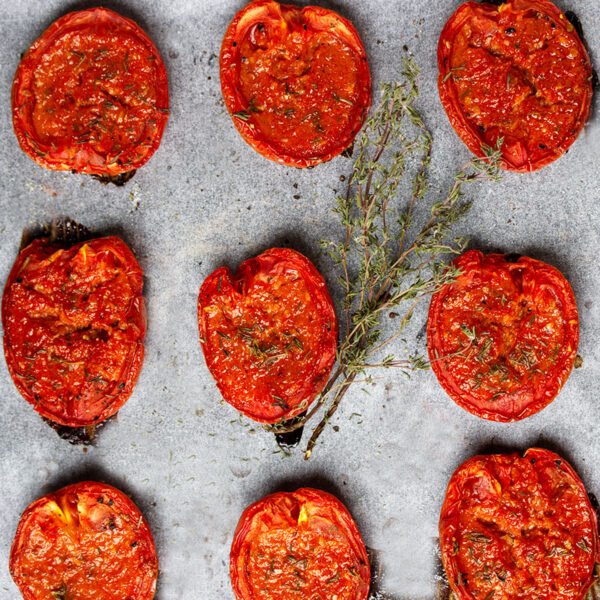 candied tomatoes after cooking on parchment paper